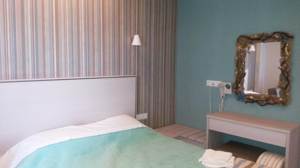 Margarita'S Rooms Potos Bagian luar foto